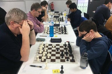 Aron Saunders won the U1820 prize with 2.5/5 in the Open.