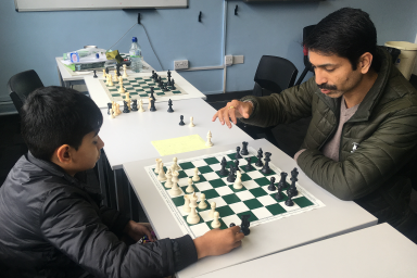 Jaspal Patil (3.5) and Aryan Patil (2/5) getting some extra analysis in between the rounds of the Minor.