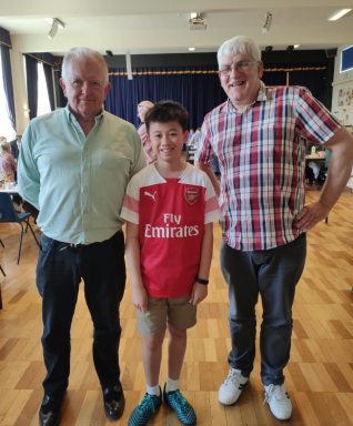 Richard Livermore, Toby Kan, and Dave Tipper pose for a team photo.