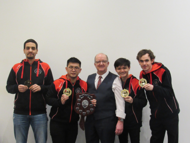 Geoff celebrating with Wei-Hao and Samy who won the Shield.