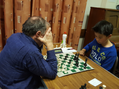 Jim Sherwin having a good think in his game against Toby Kan.