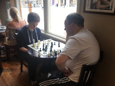 Oli analysing GM Danny Gormally's game against GM Peter Wells with Danny.